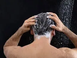 A man using shower Gel